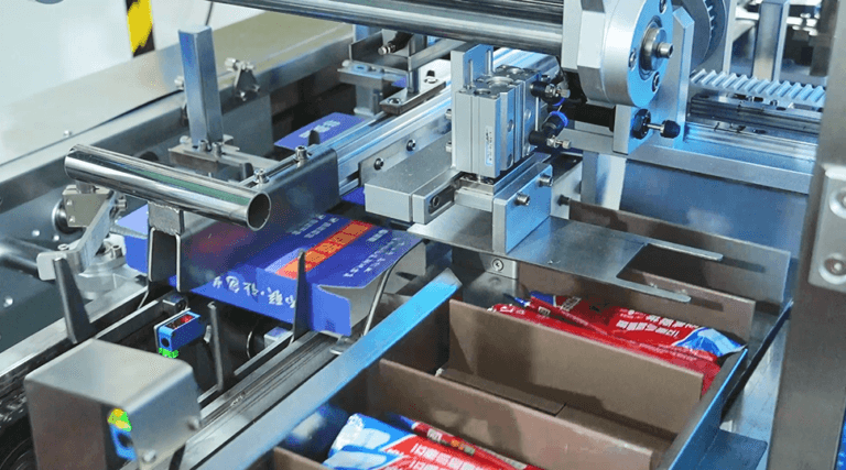 UBL's servo-driven high-speed glue-spray cartoning machine is in operation, filling coffee sticks into specialized cartons to complete the packaging process.